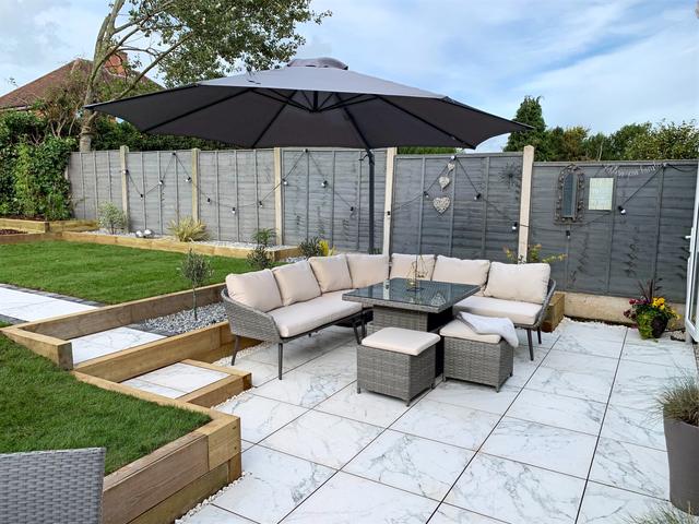Porcelain patio and lawn landscaped in Sutton Coldfield