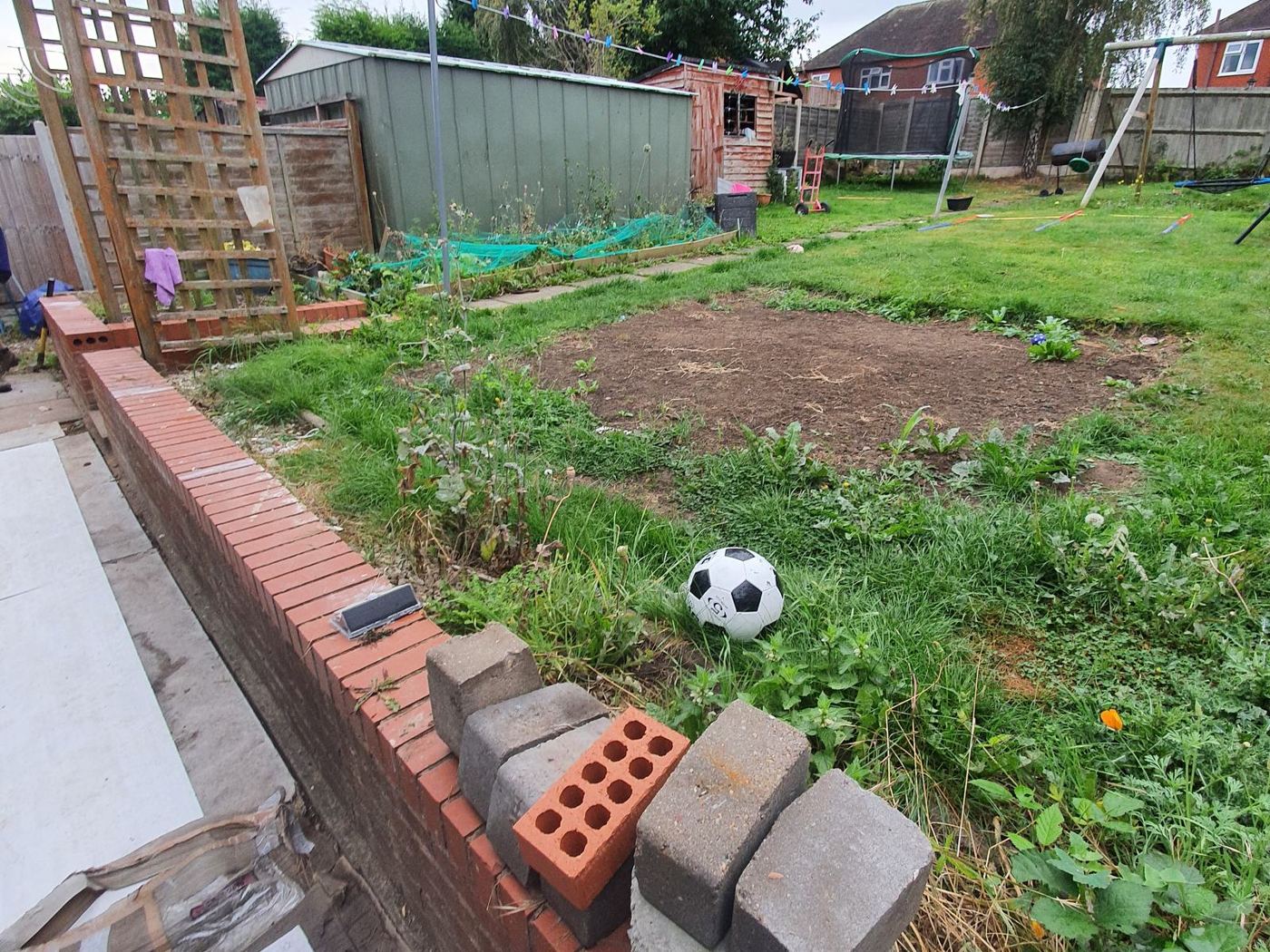 Before: Uneven garden in Tamworth before work
