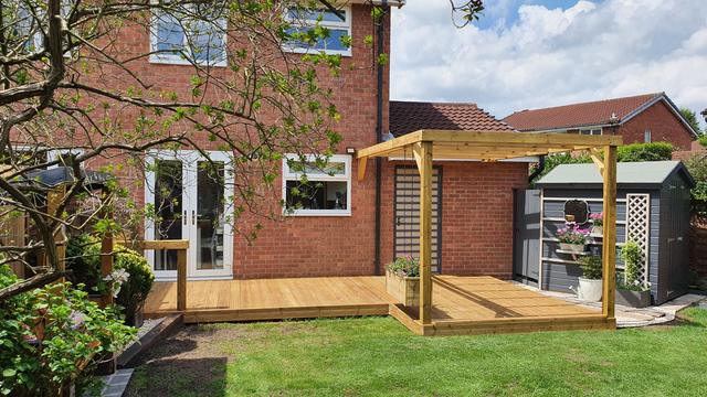 Pergola and deck on a lawn